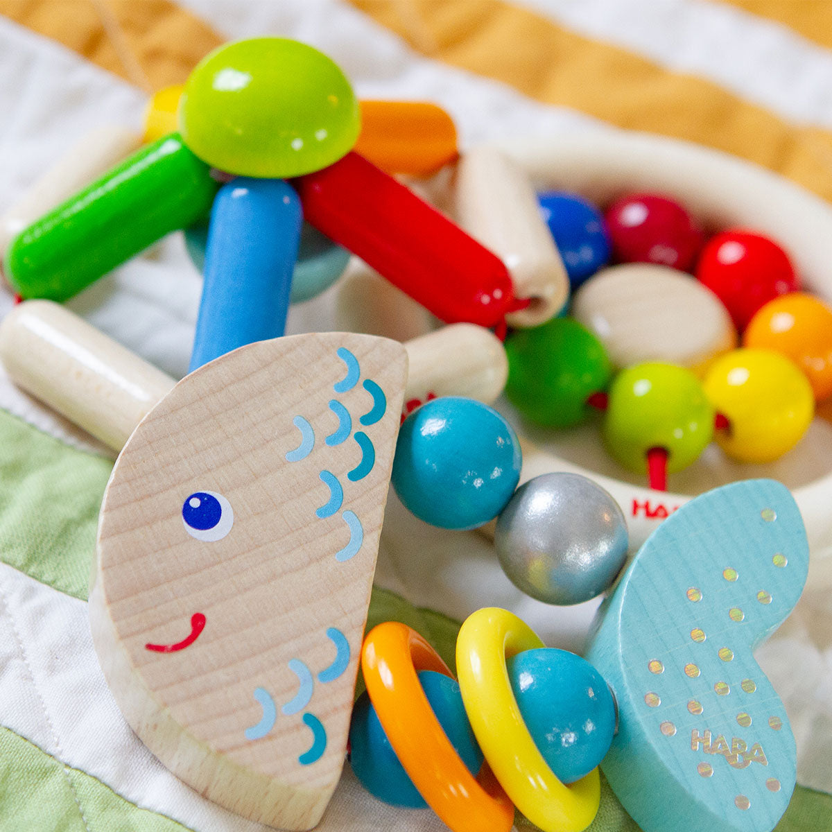 305582-rattlefish-wooden-baby-rattle-GROVE_ls4.jpg