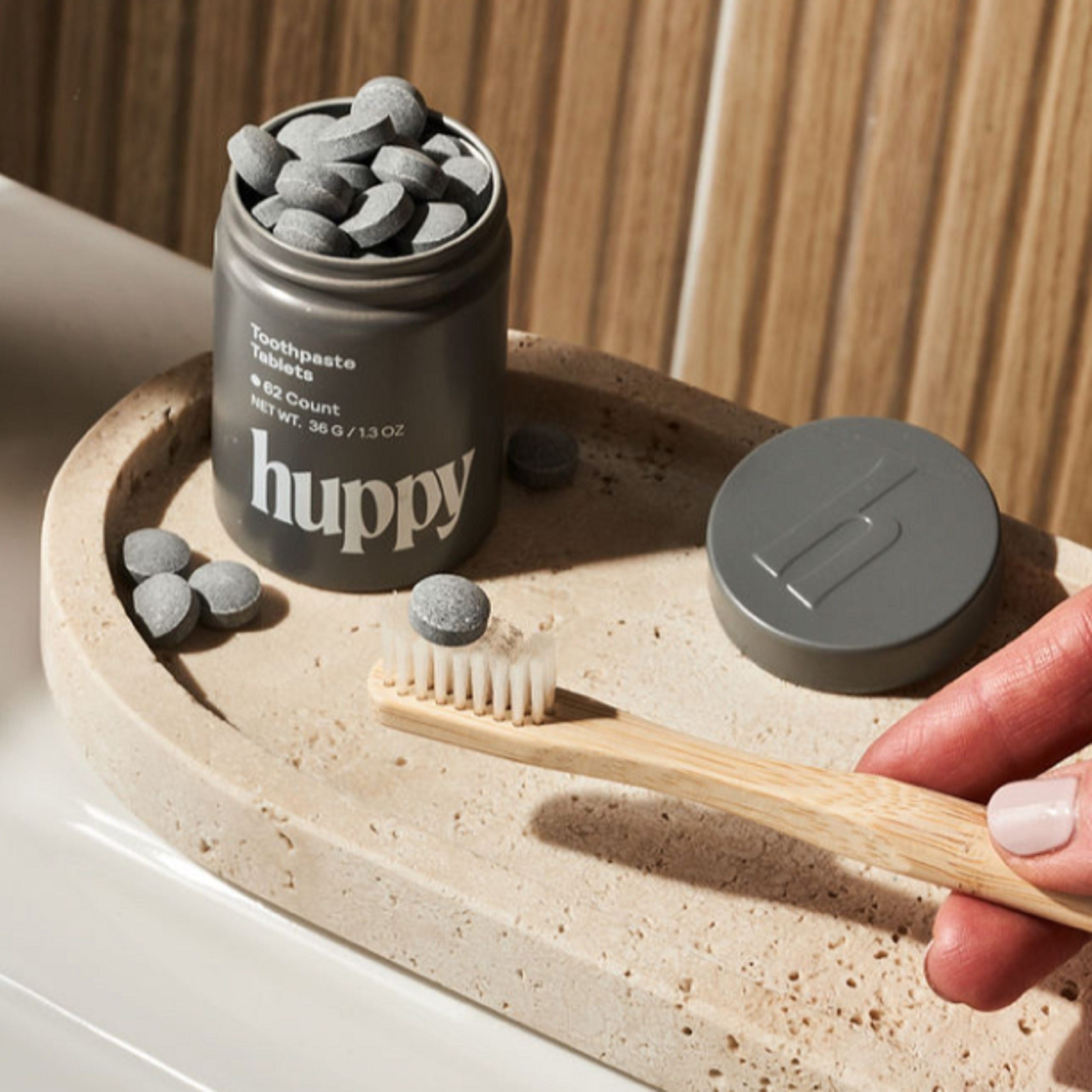 Huppy_Toothpaste_Tablets_with_Tin_Charcoal_Mint_Lifestyle_1_nnlo7l.jpg