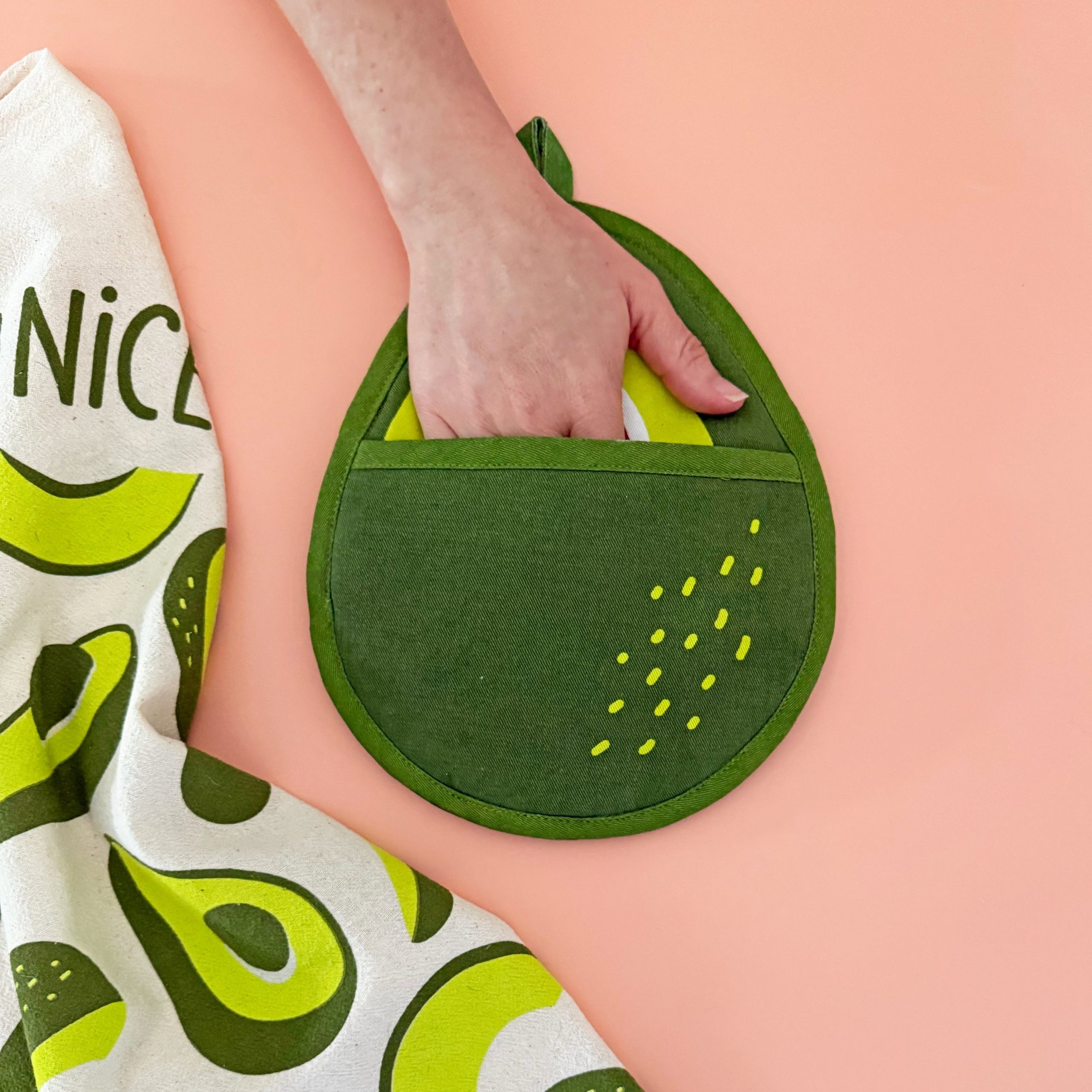 avocado-with-hand_SQ.jpg