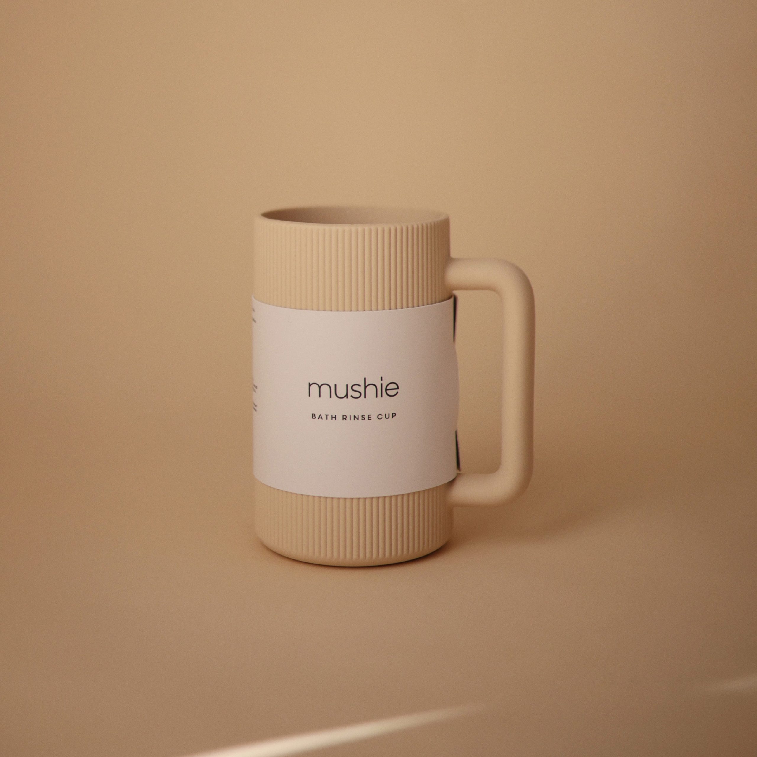 mushie_BathRinseCup_ShiftingSand_04.jpg