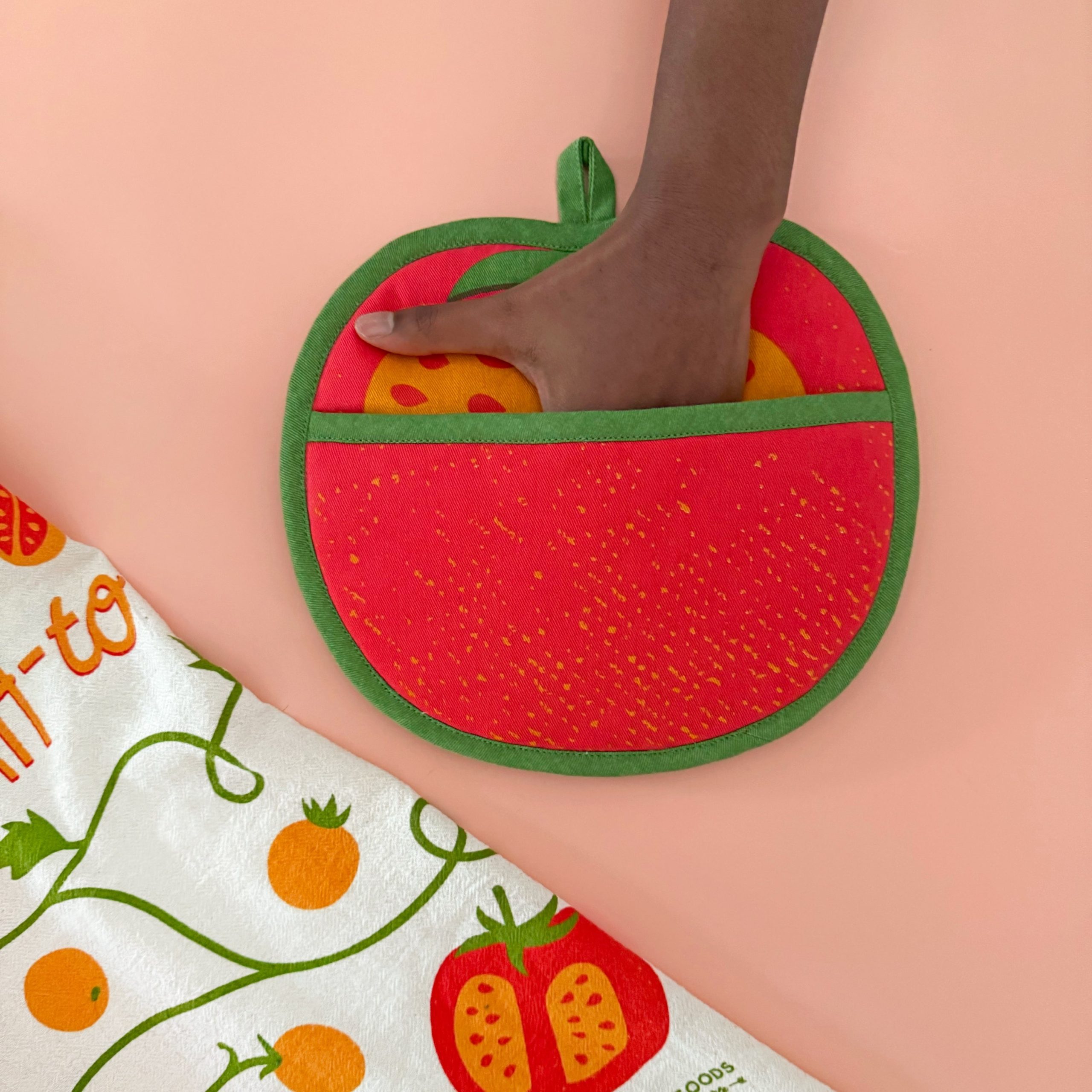 tomato-with-hand_SQ.jpg